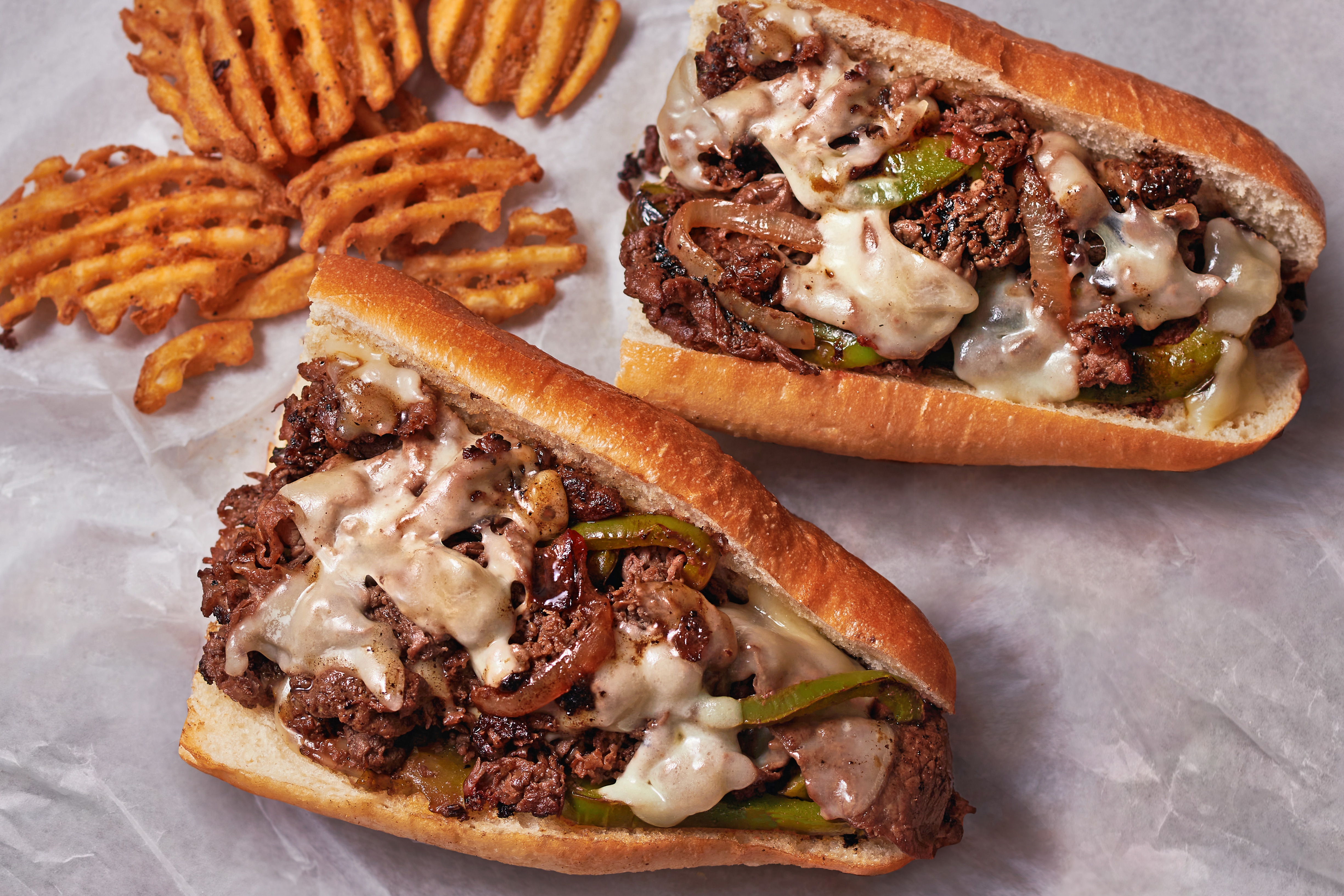 Montreal Cheesesteak with Grilled Peppers and Onions – - Recipe