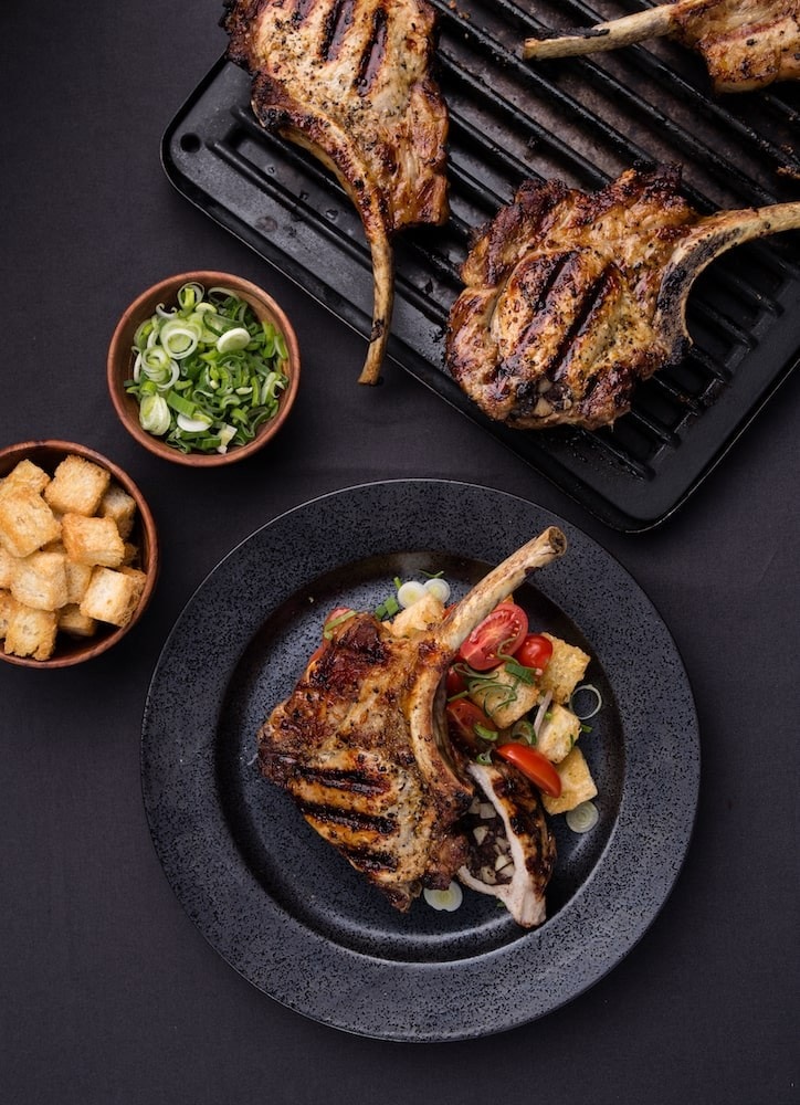 Table-grilled meat with sides Table-grilled meat with sides