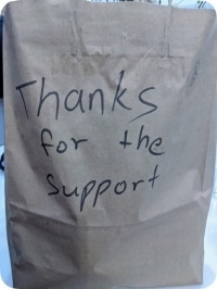 Great American Takeout Paper Bag Write notes for your customers on the delivery bags.