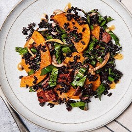 Roasted squash and black rice salad with umami vinaigrette.