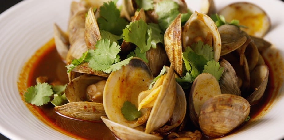 Watch Chef Kyle Jakobi Prepare Surf n' Turf Clams